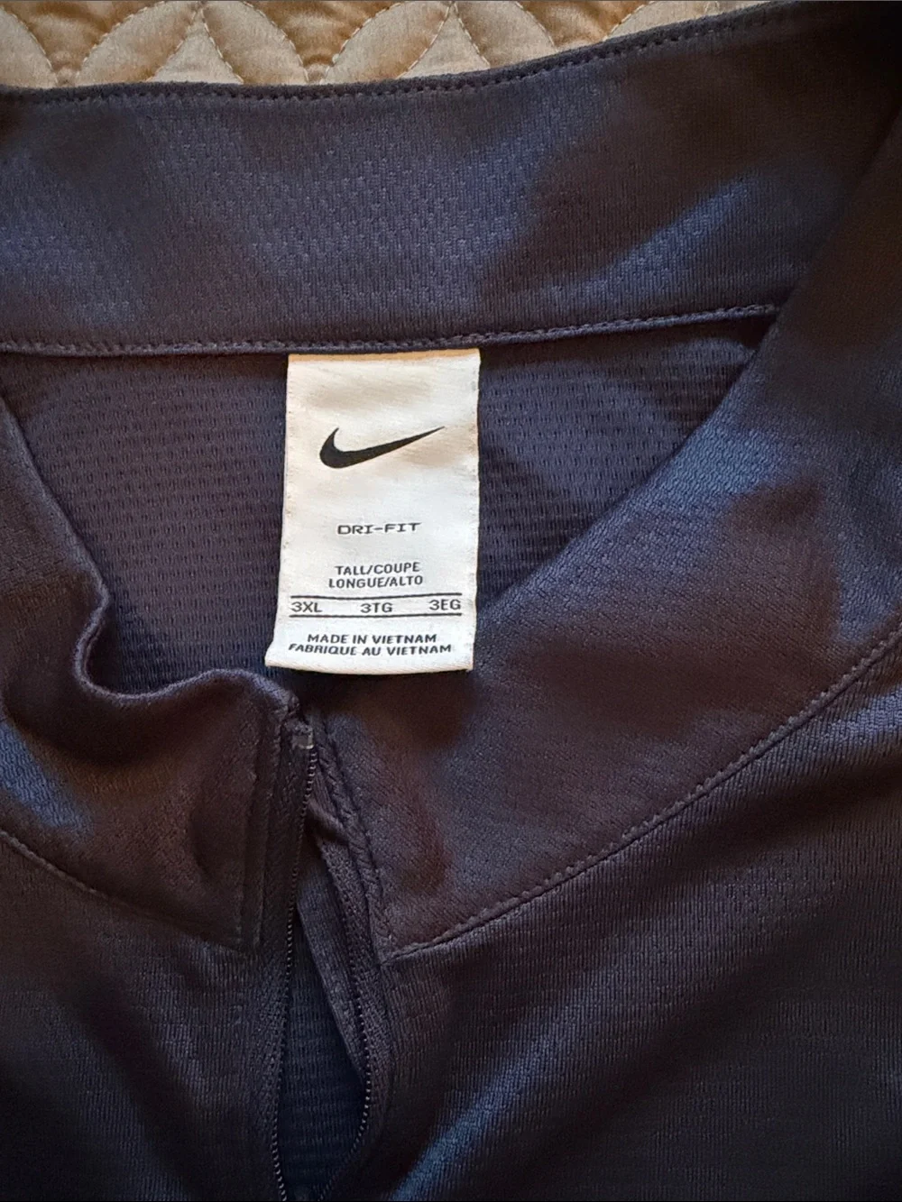 Nike Black Half-Zip Performance Pullover with White Swoosh